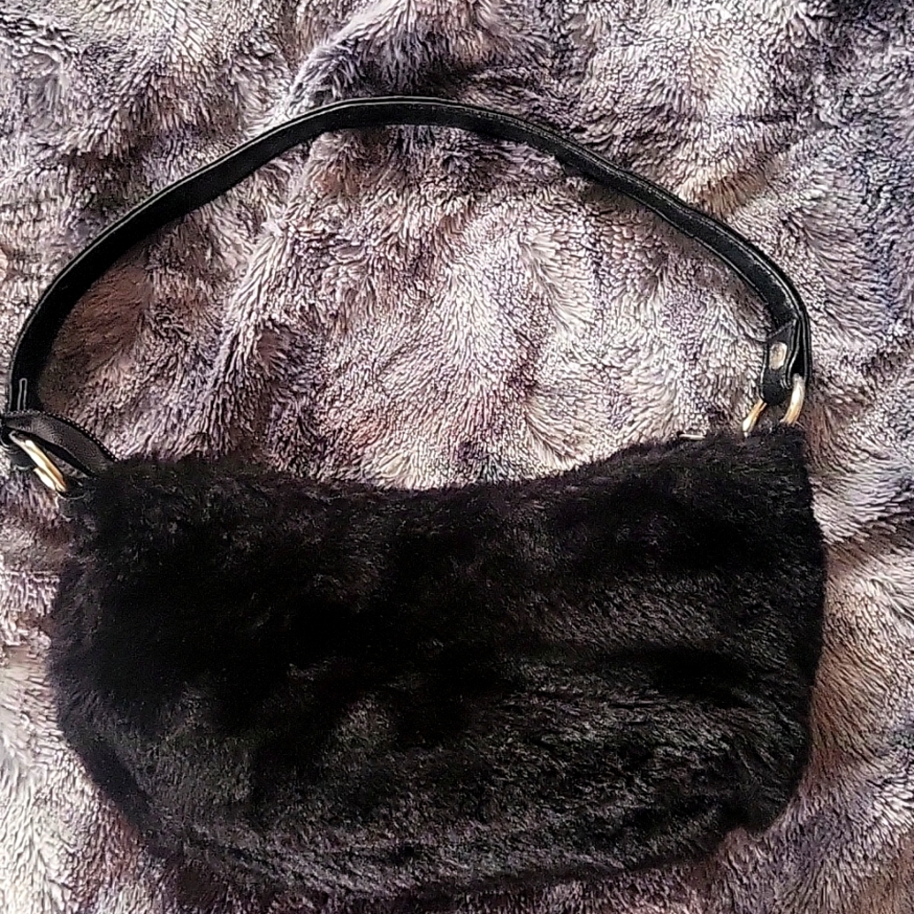 Small black fuzzy purse